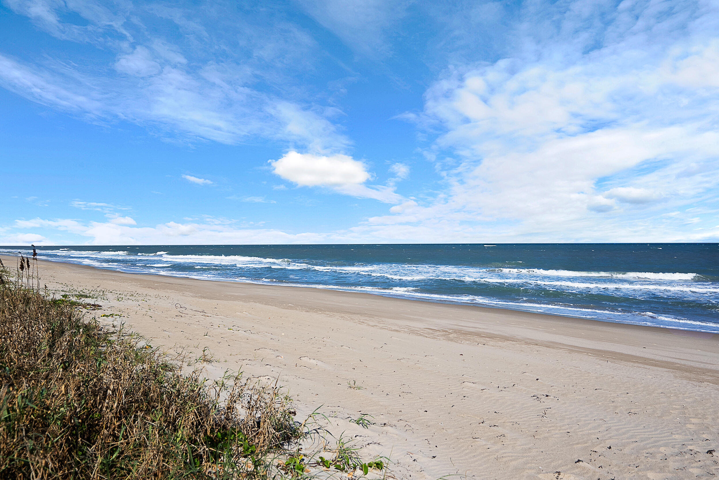 4100 North Hwy A1A, Unit 315 Hutchinson Island, FL 34949 - Photo 12 of 41 a view of an ocean and beach