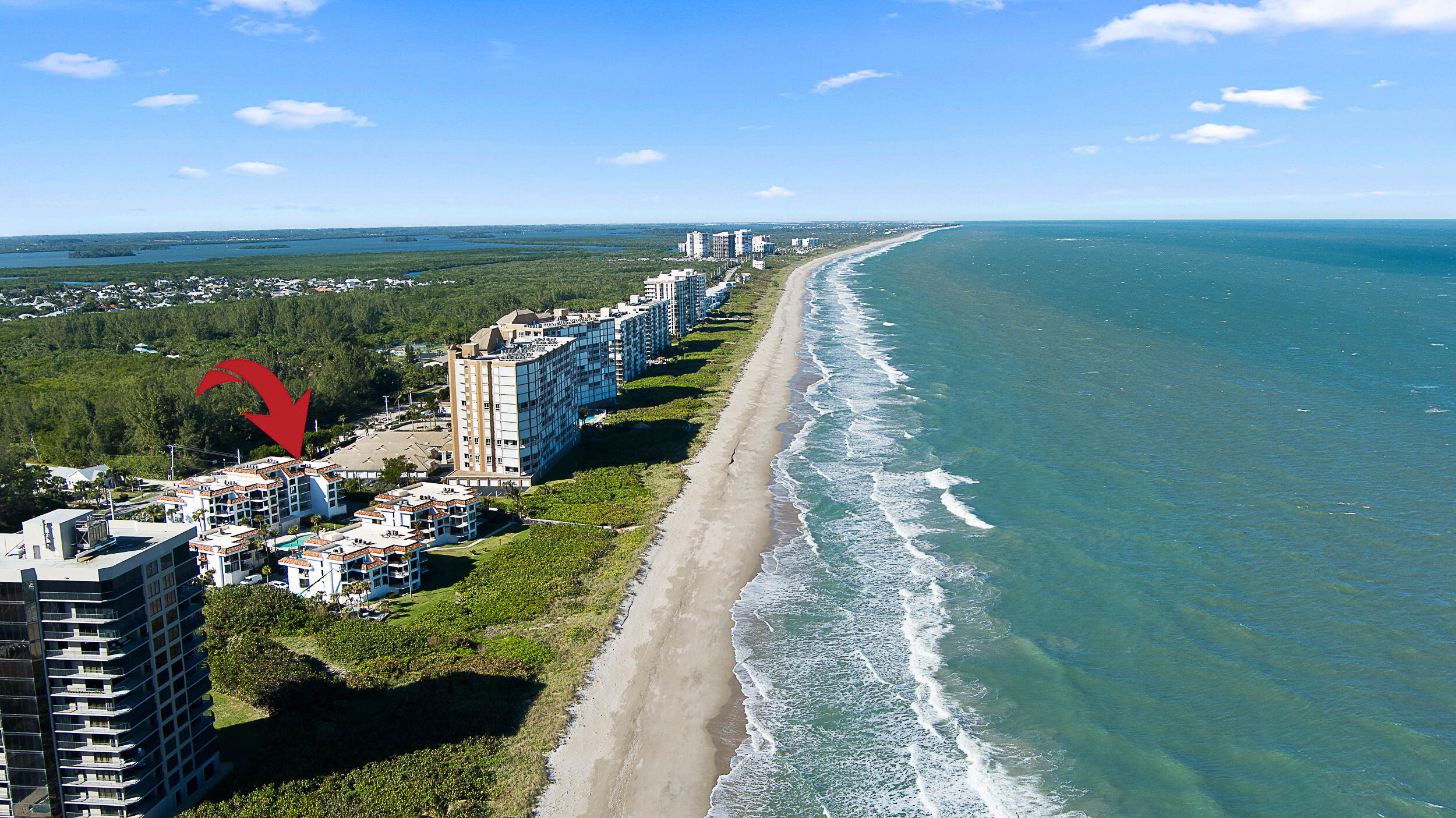 4100 North Hwy A1A, Unit 315 Hutchinson Island, FL 34949 - Photo 13 of 41 a view of a lake with a garden
