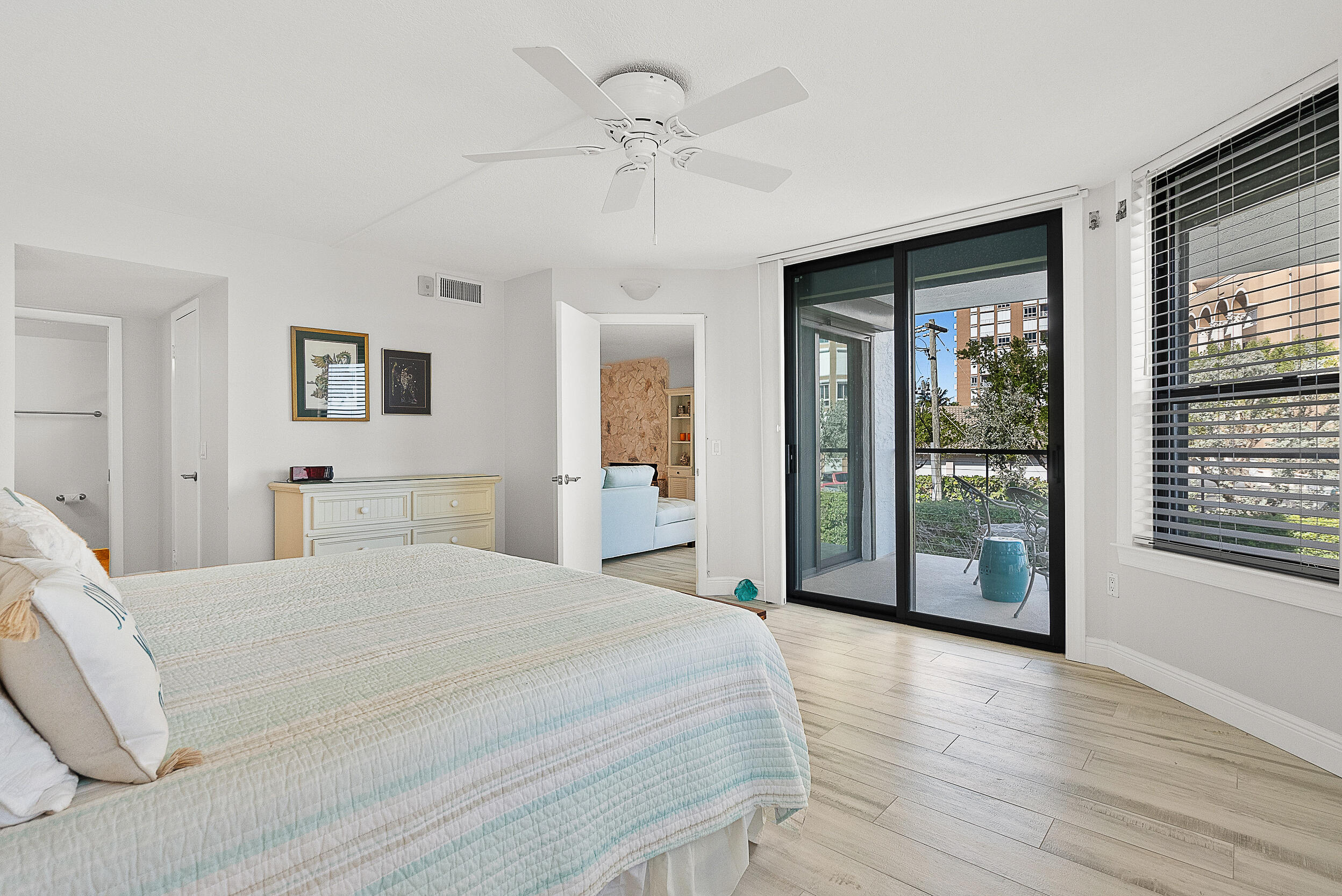 4100 North Hwy A1A, Unit 315 Hutchinson Island, FL 34949 - Photo 19 of 41 a spacious bedroom with a large bed and a large window