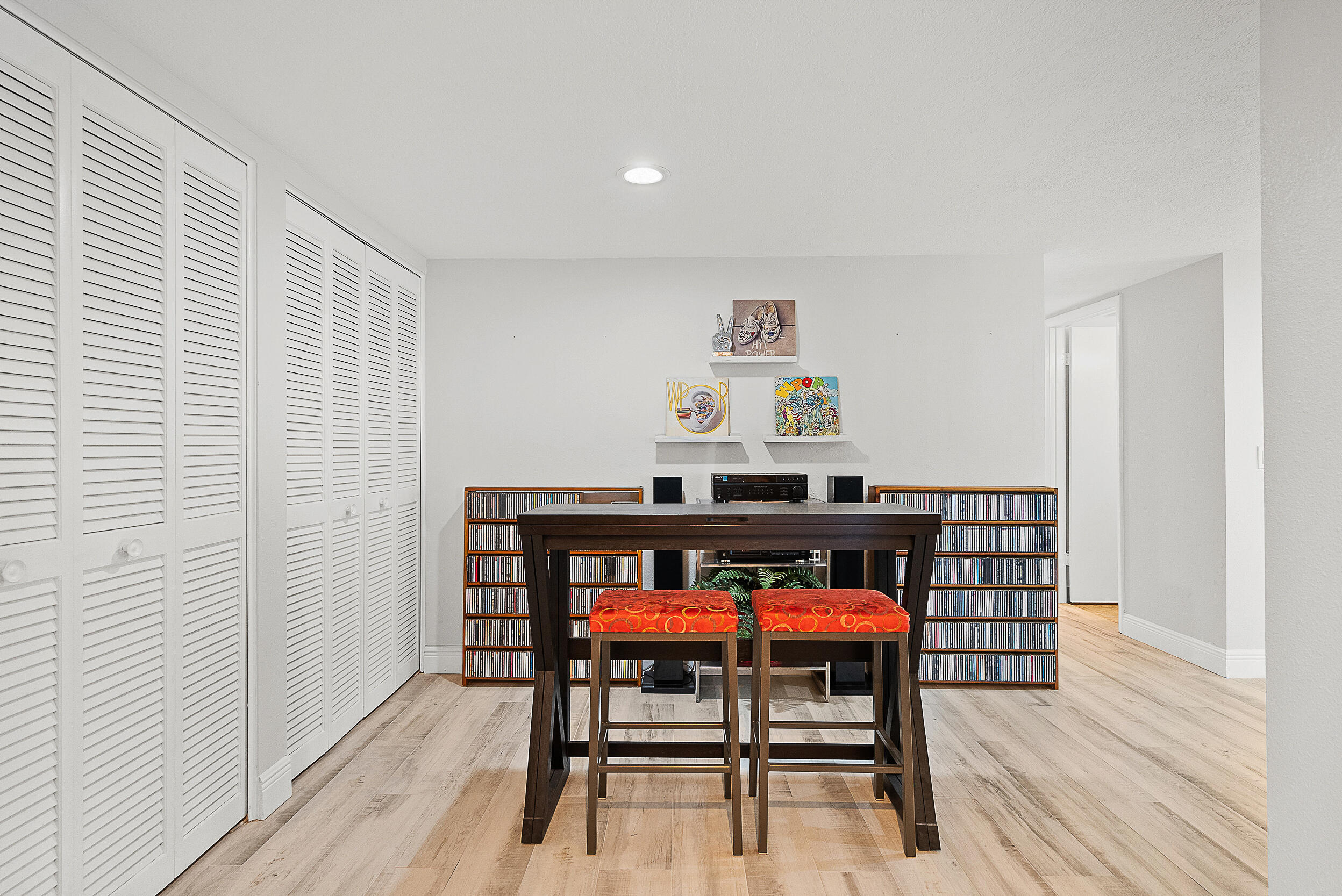 4100 North Hwy A1A, Unit 315 Hutchinson Island, FL 34949 - Photo 24 of 41 a living room with furniture and a wooden floor