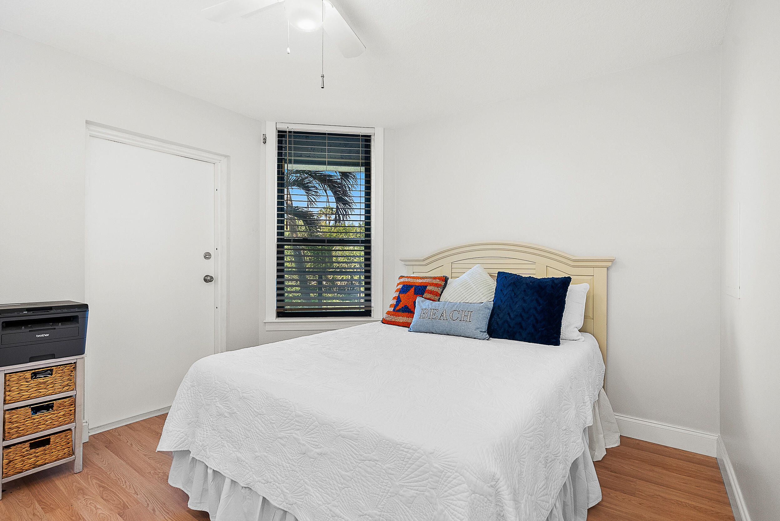 4100 North Hwy A1A, Unit 315 Hutchinson Island, FL 34949 - Photo 25 of 41 a bedroom with a bed and a dresser