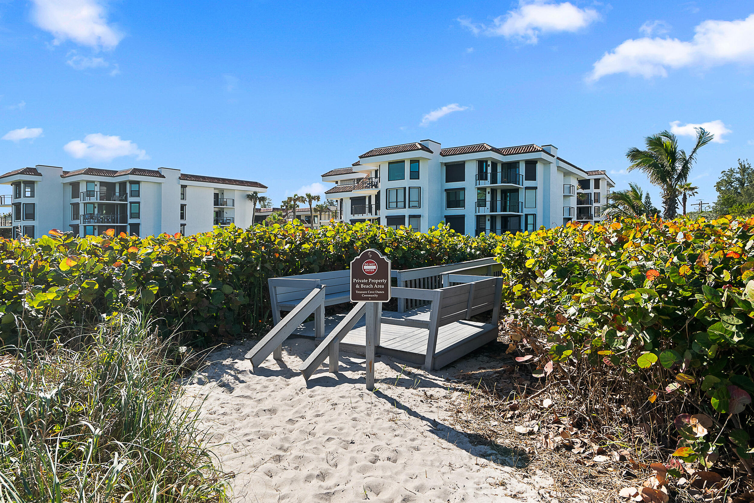 4100 North Hwy A1A, Unit 315 Hutchinson Island, FL 34949 - Photo 35 of 41 a view of a house with backyard and sitting area