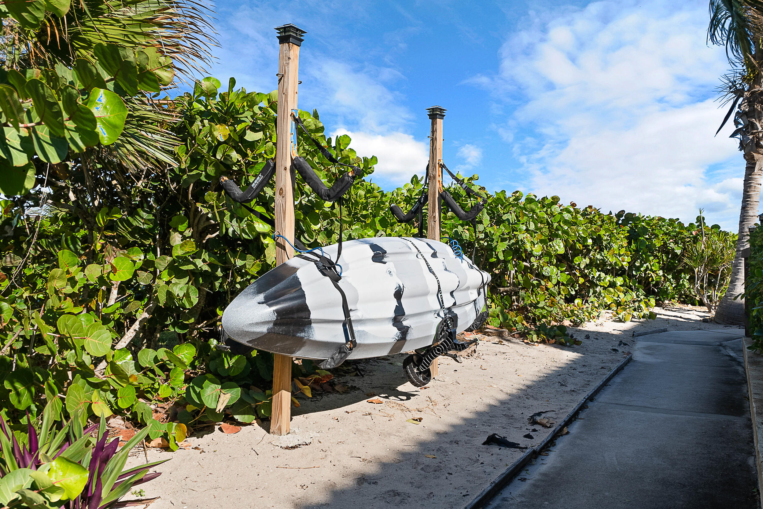 4100 North Hwy A1A, Unit 315 Hutchinson Island, FL 34949 - Photo 36 of 41 a view of a backyard with sitting area