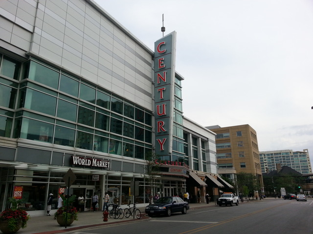 807 Davis Street, Unit 512 Evanston, IL 60201 - Photo 21 of 23 a city street lined with tall buildings and a street light