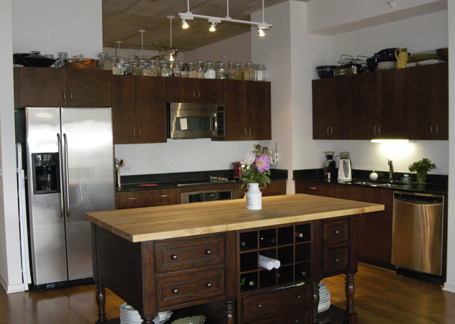 807 Davis Street, Unit 512 Evanston, IL 60201 - Photo 3 of 23 a kitchen with a sink and a refrigerator