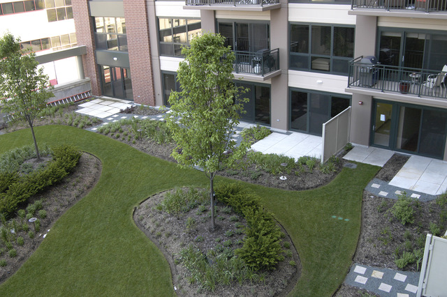 807 Davis Street, Unit 512 Evanston, IL 60201 - Photo 9 of 23 a front view of a house with a yard
