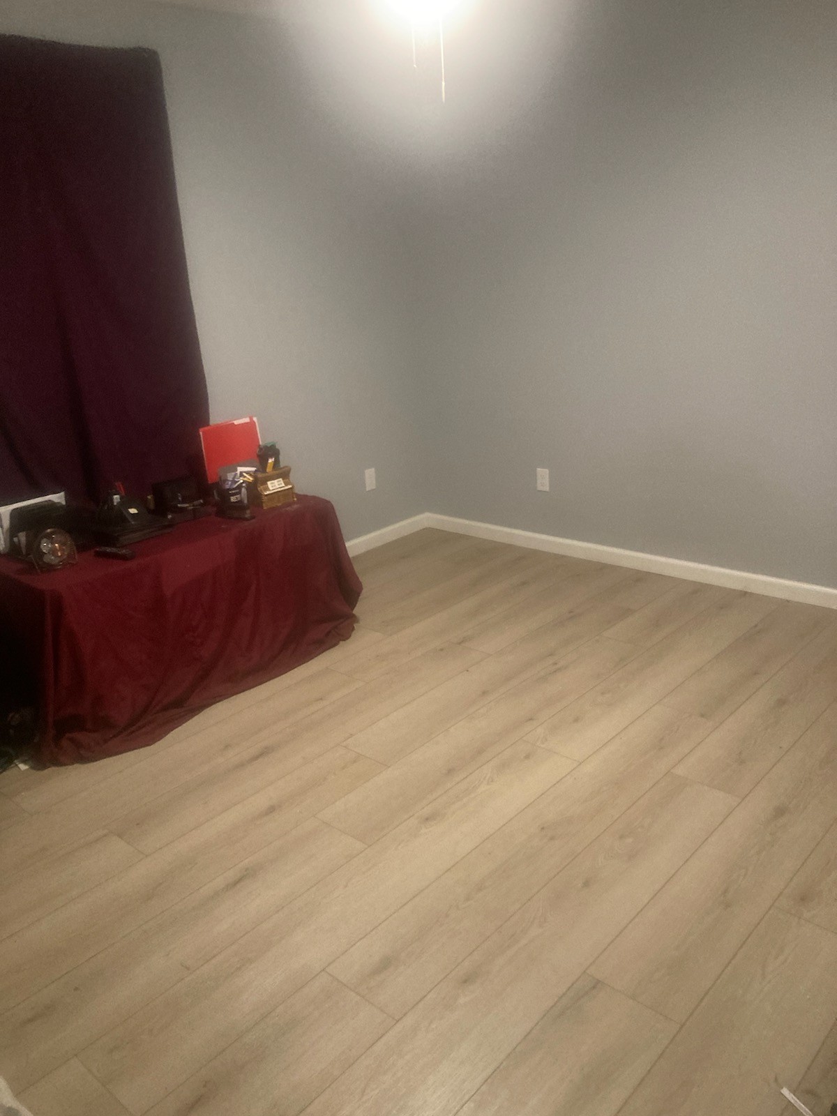 110 Water Street Big Sandy, TN 38221 - Photo 11 of 14 a room with hard wood floor