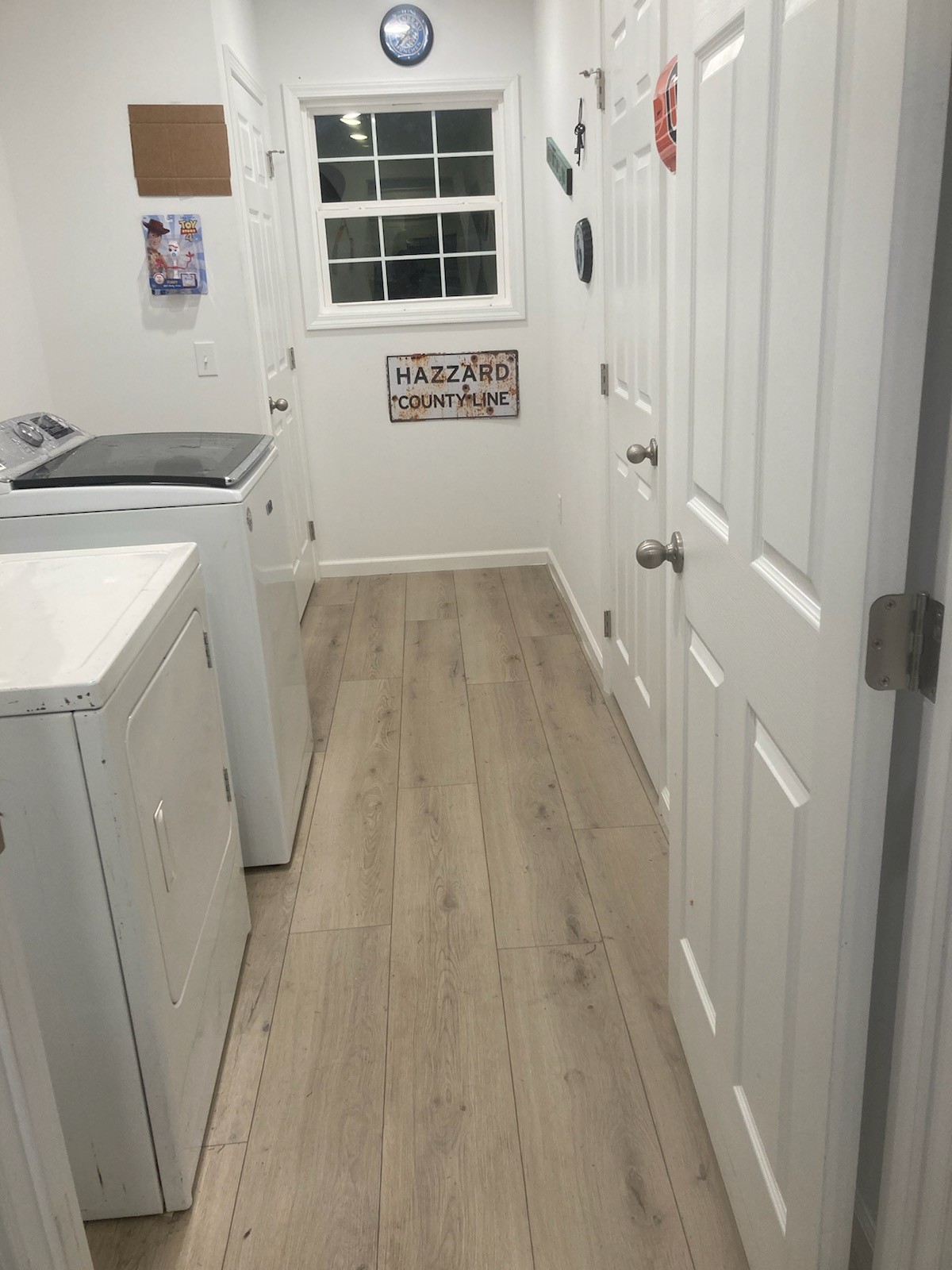 110 Water Street Big Sandy, TN 38221 - Photo 10 of 14 a view of a storage & utility room with a window