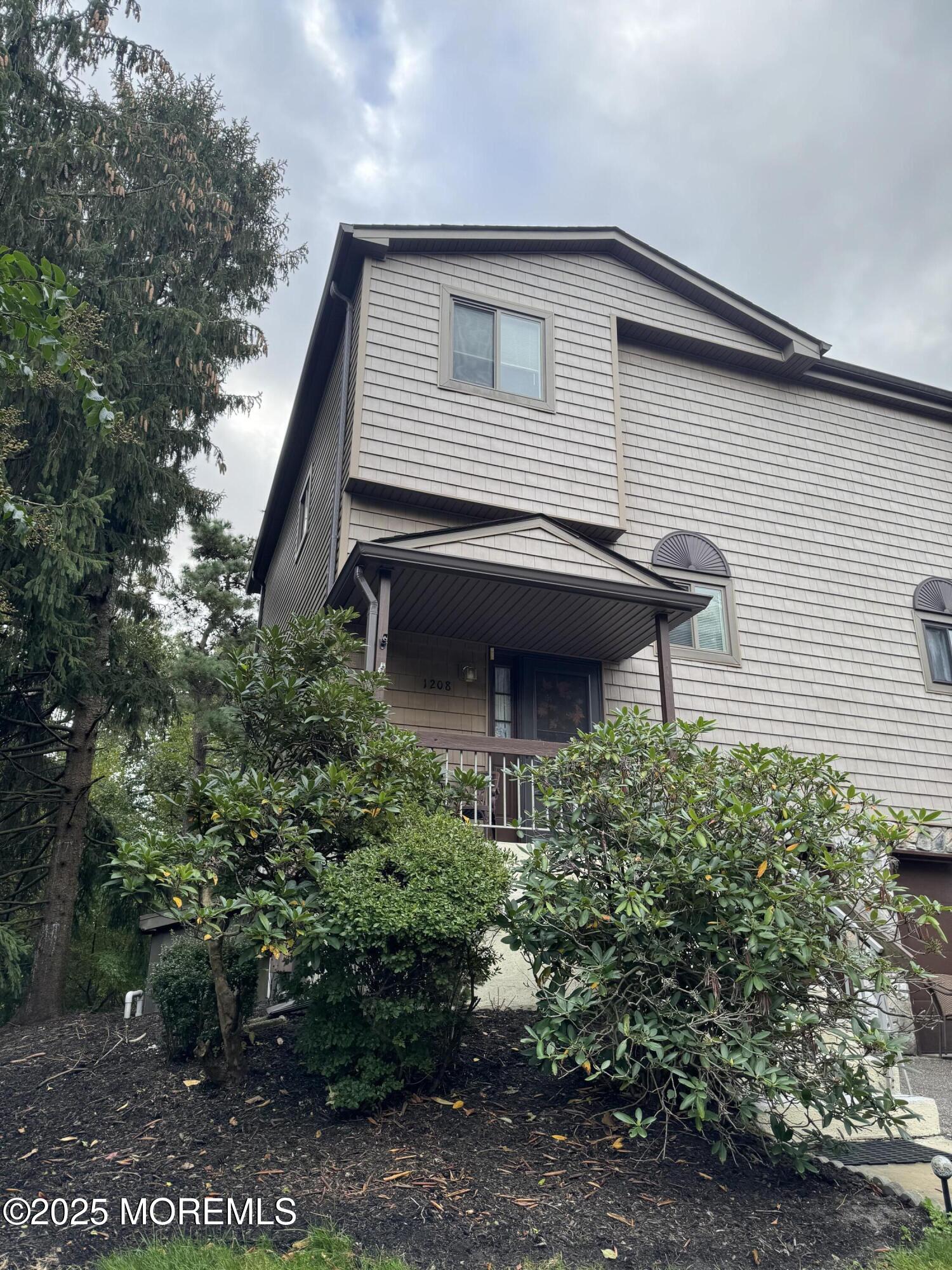 a house view with a outdoor space