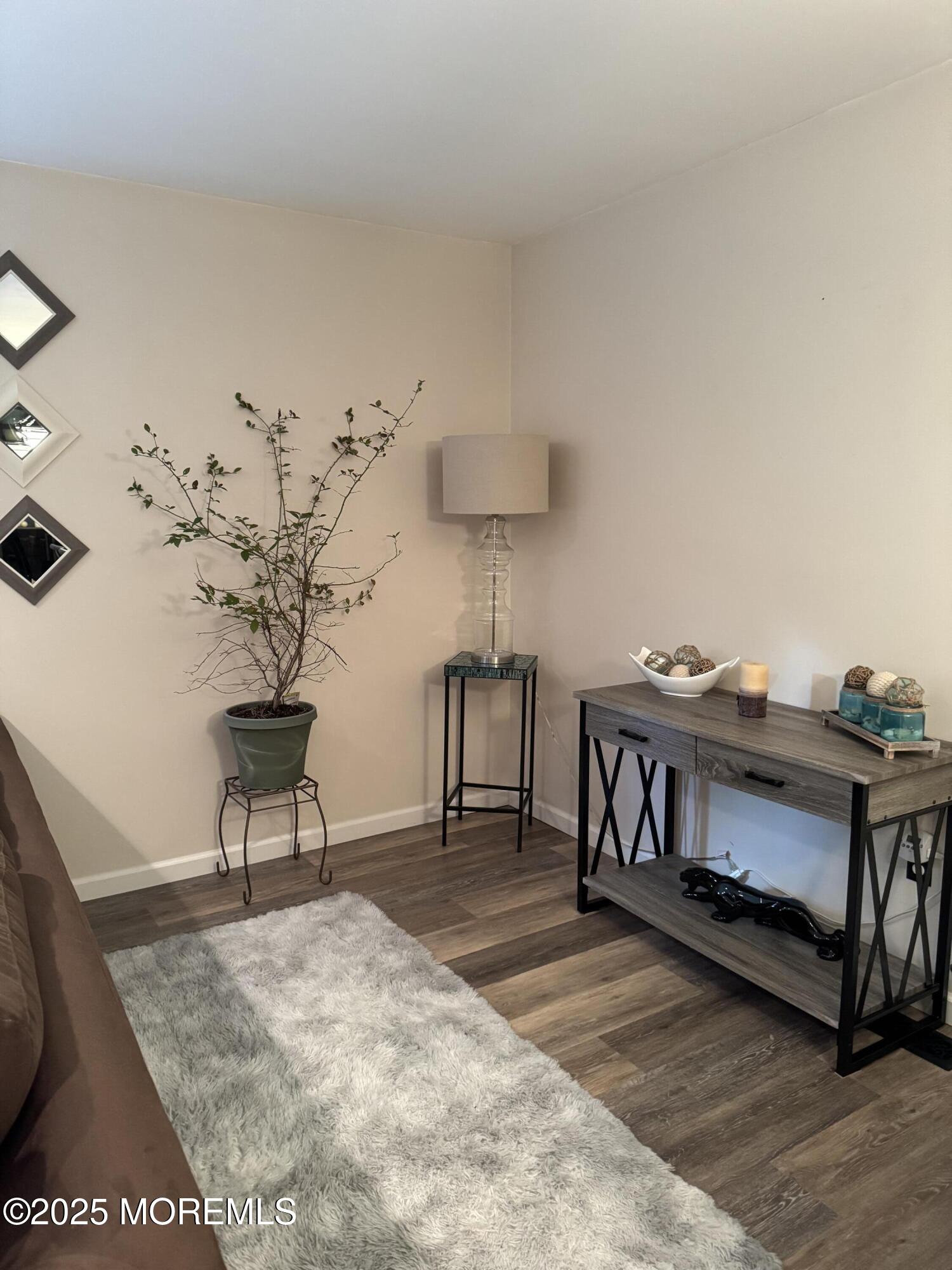 1208 Alpine Trail Neptune Township, NJ 07753 - Photo 12 of 29 a living room with furniture and a wooden floor