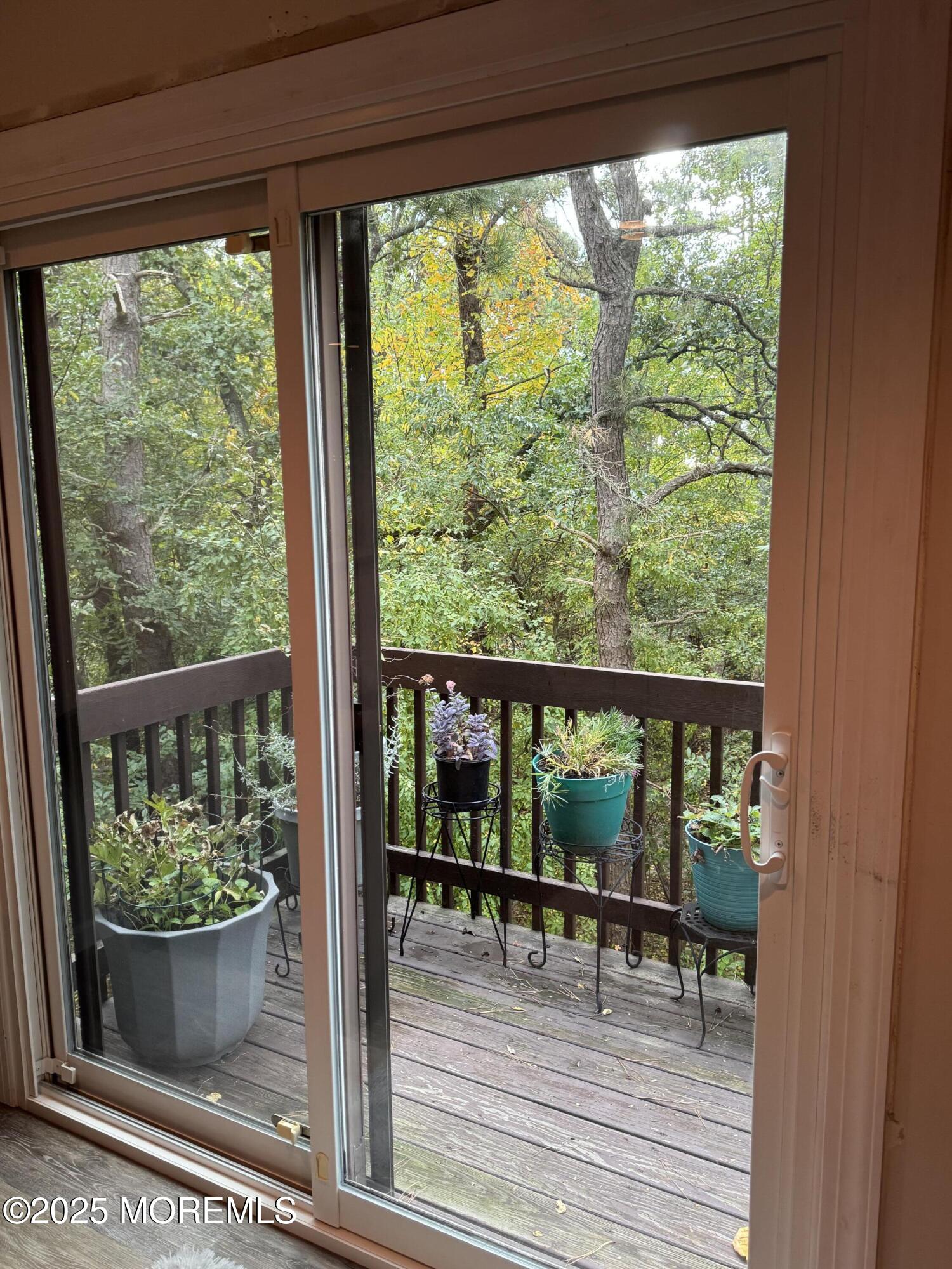 1208 Alpine Trail Neptune Township, NJ 07753 - Photo 13 of 29 a view of a chairs and table in patio of a house
