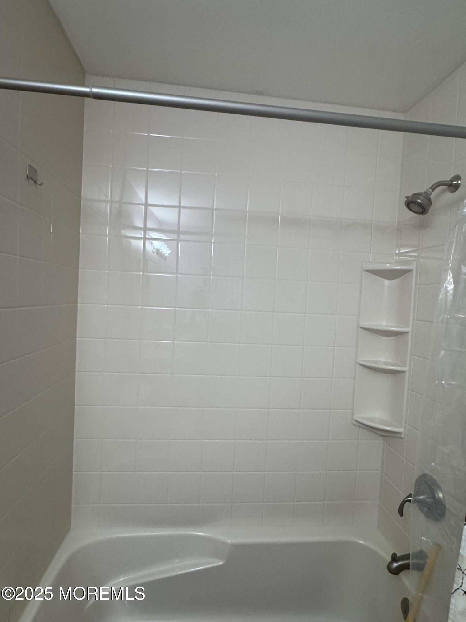 1208 Alpine Trail Neptune Township, NJ 07753 - Photo 23 of 29 a bathroom with a bathtub