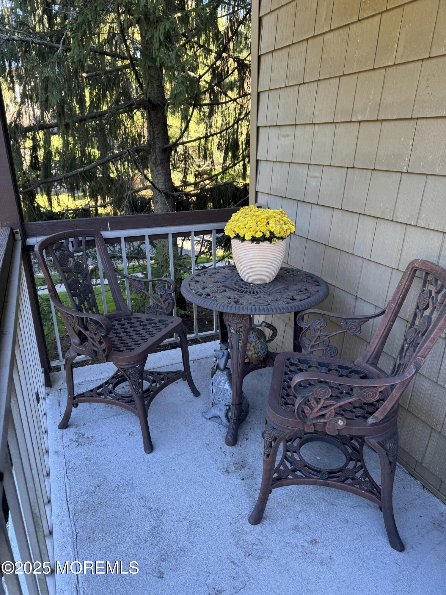 1208 Alpine Trail Neptune Township, NJ 07753 - Photo 5 of 29 a view of a chairs and table in a patio