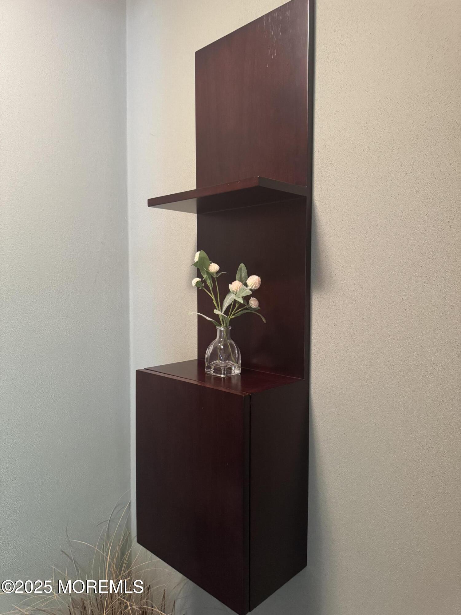 1208 Alpine Trail Neptune Township, NJ 07753 - Photo 8 of 29 a vase with flowers sitting on a table