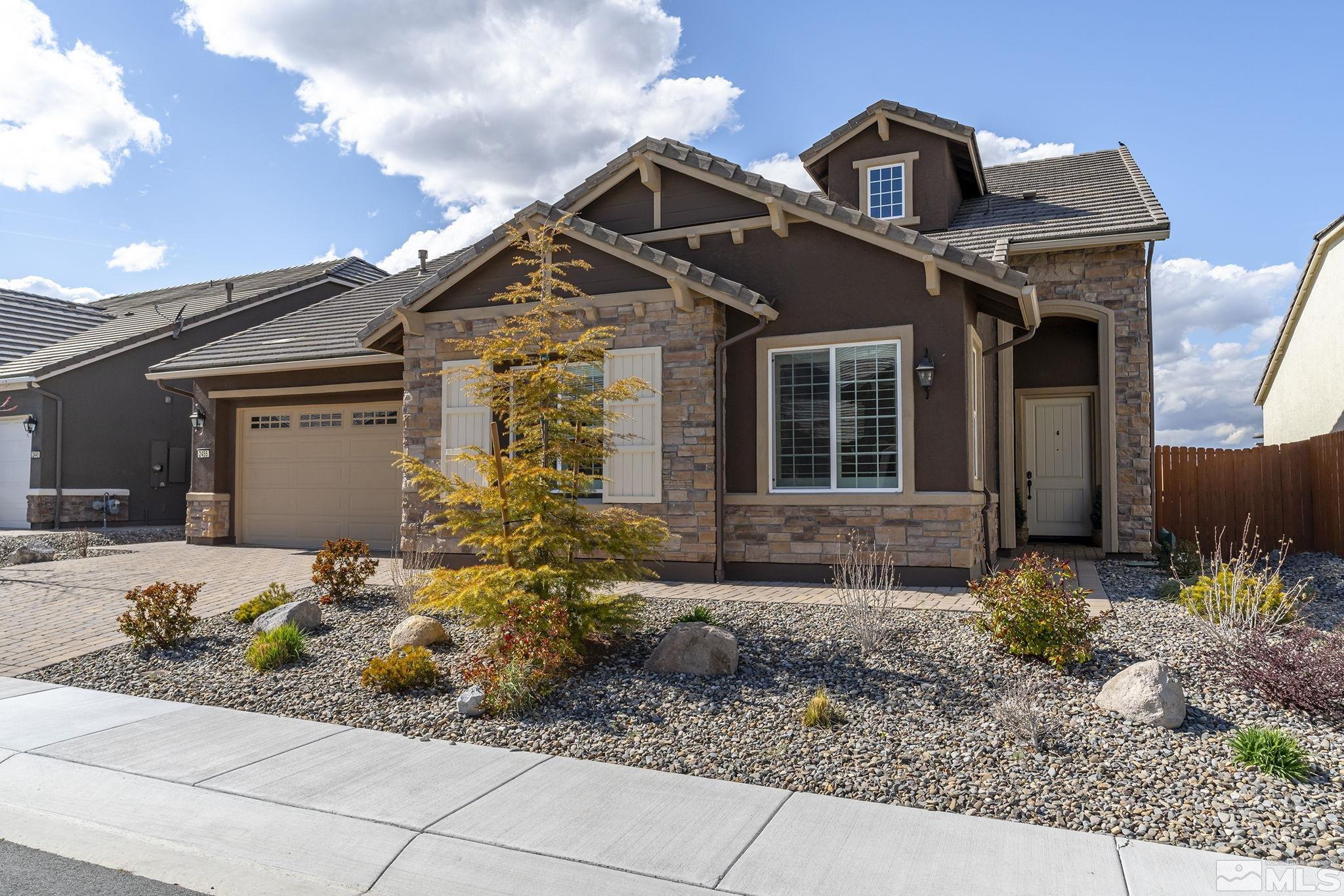 2455 Buttermere Court Reno, NV 89521 - Photo 1 of 38 a front view of a house with a sitting area