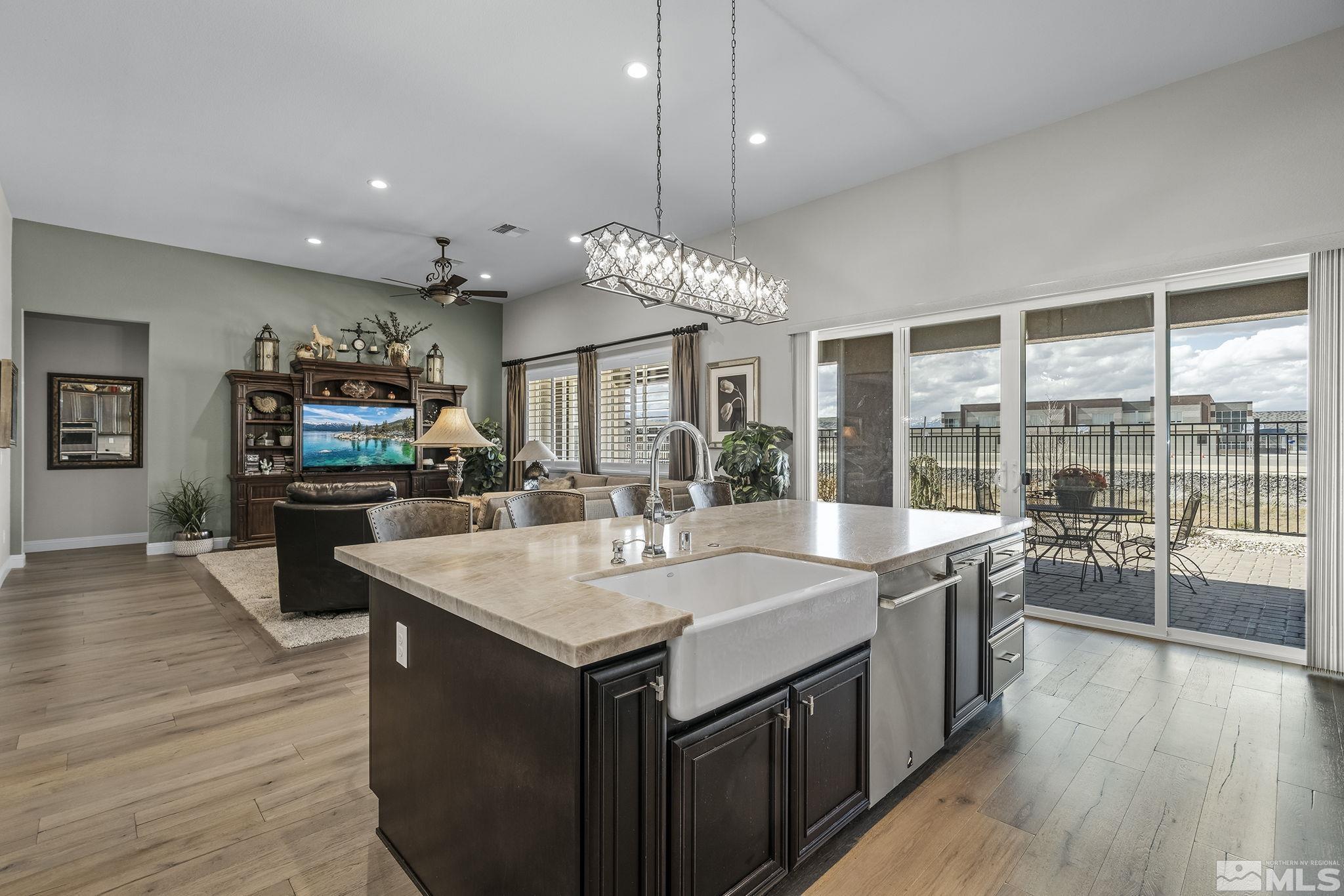 2455 Buttermere Court Reno, NV 89521 - Photo 15 of 38 a large kitchen with kitchen island a large island in it