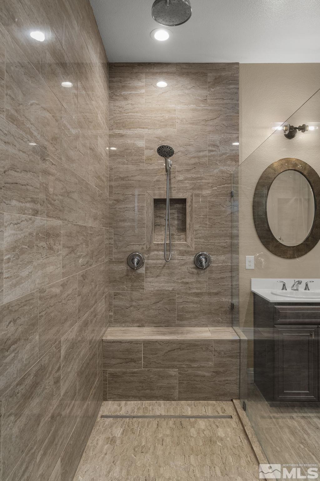 2455 Buttermere Court Reno, NV 89521 - Photo 19 of 38 a bathroom with a sink a toilet and shower