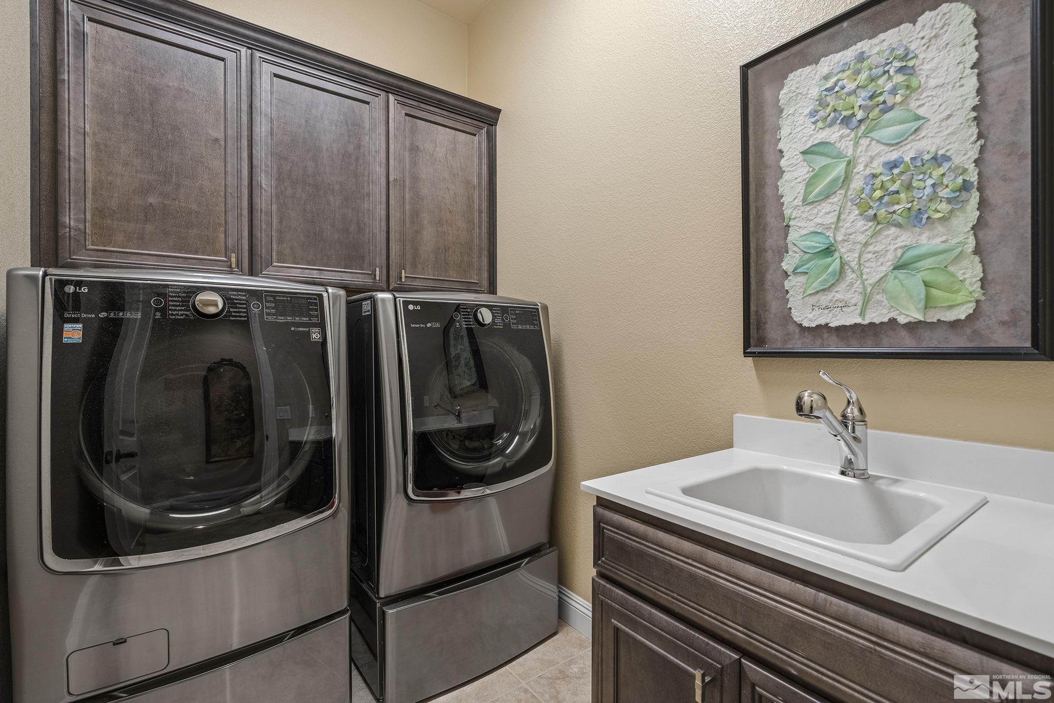 2455 Buttermere Court Reno, NV 89521 - Photo 23 of 38 a utility room with dryer and washer