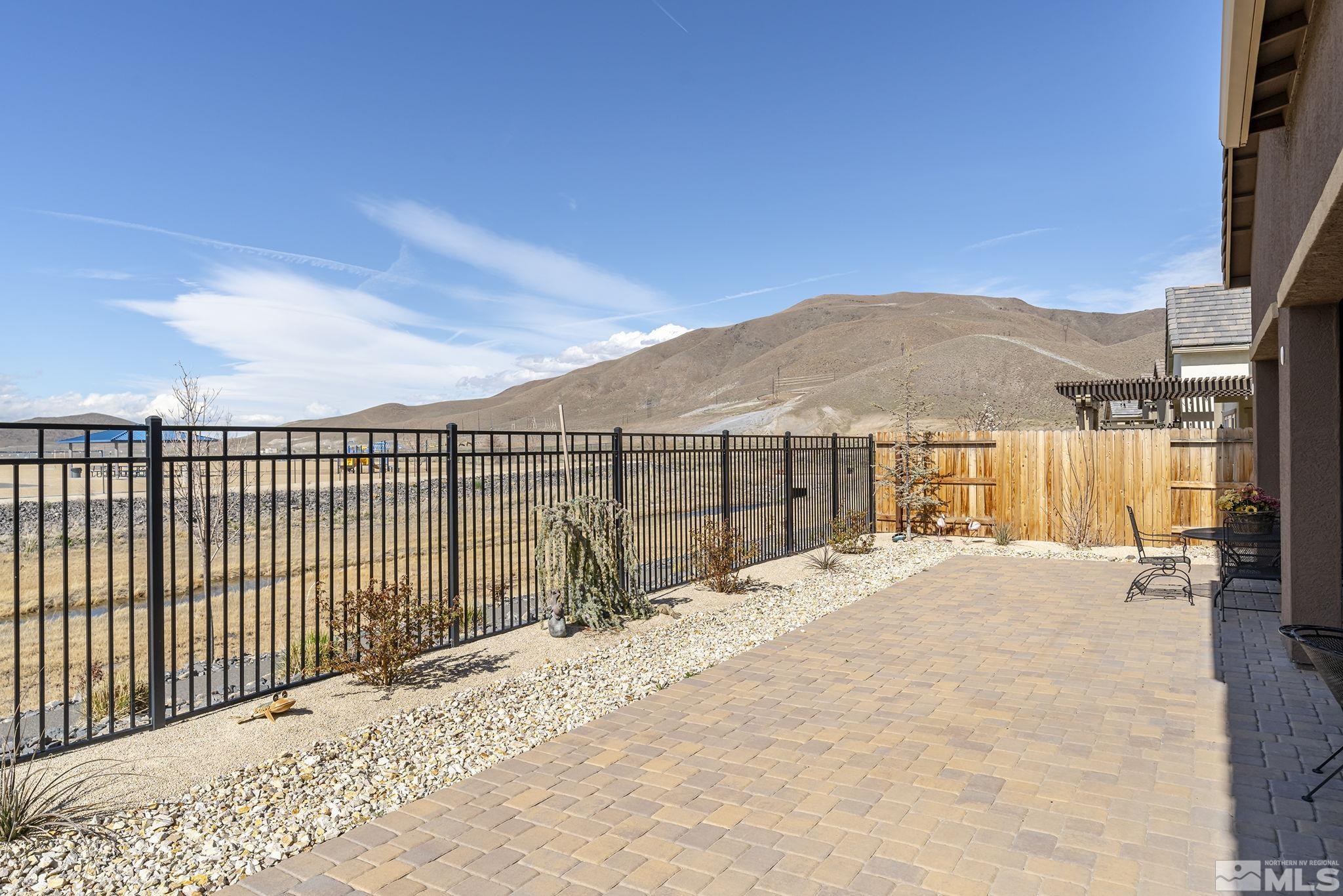 2455 Buttermere Court Reno, NV 89521 - Photo 27 of 38 a view of a backyard with a fence