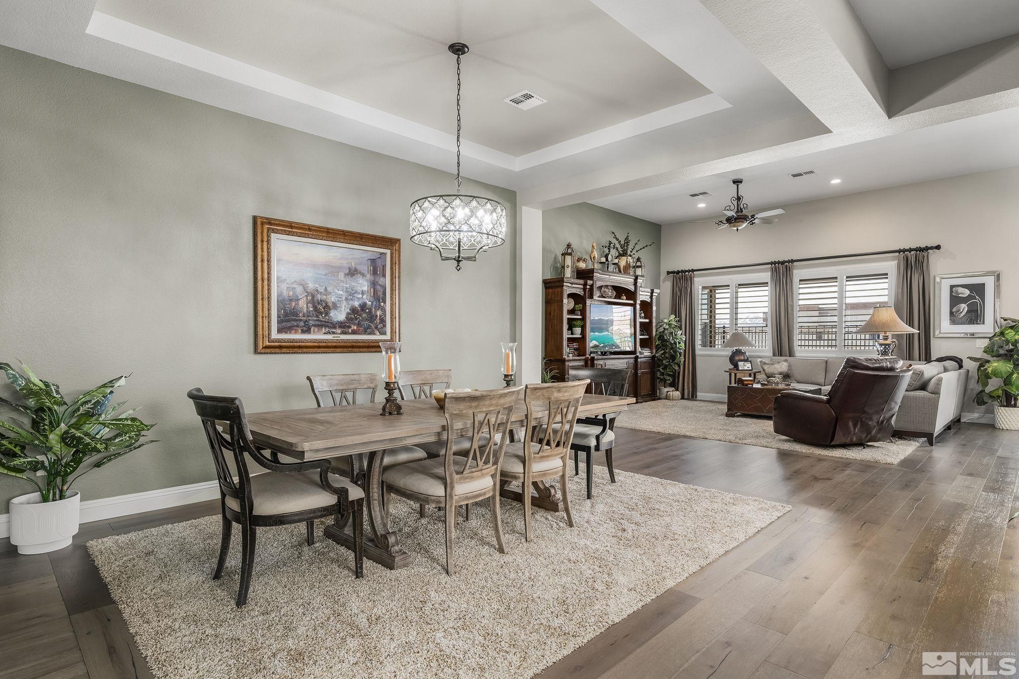 2455 Buttermere Court Reno, NV 89521 - Photo 3 of 38 a view of a dining room with furniture window and wooden floor