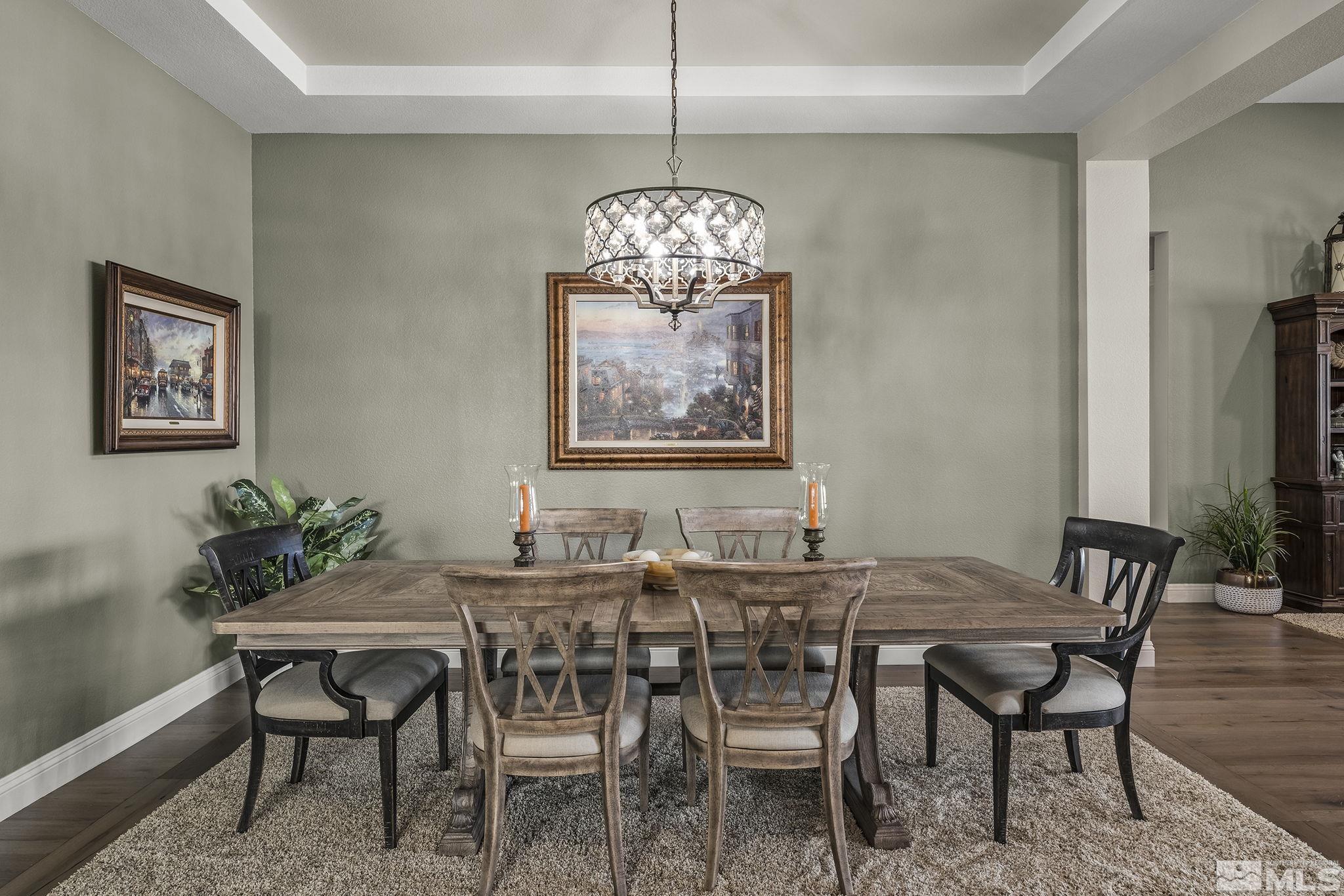 2455 Buttermere Court Reno, NV 89521 - Photo 4 of 38 a view of a dining room with furniture window and wooden floor