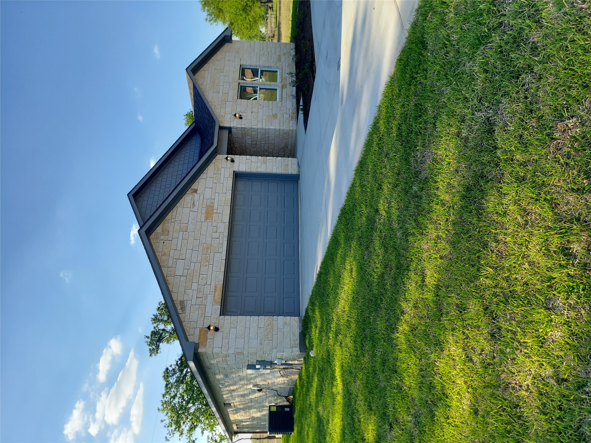 a house view with a garden space