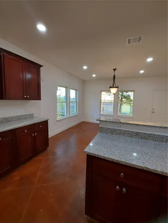 a view of room with hardwood floor