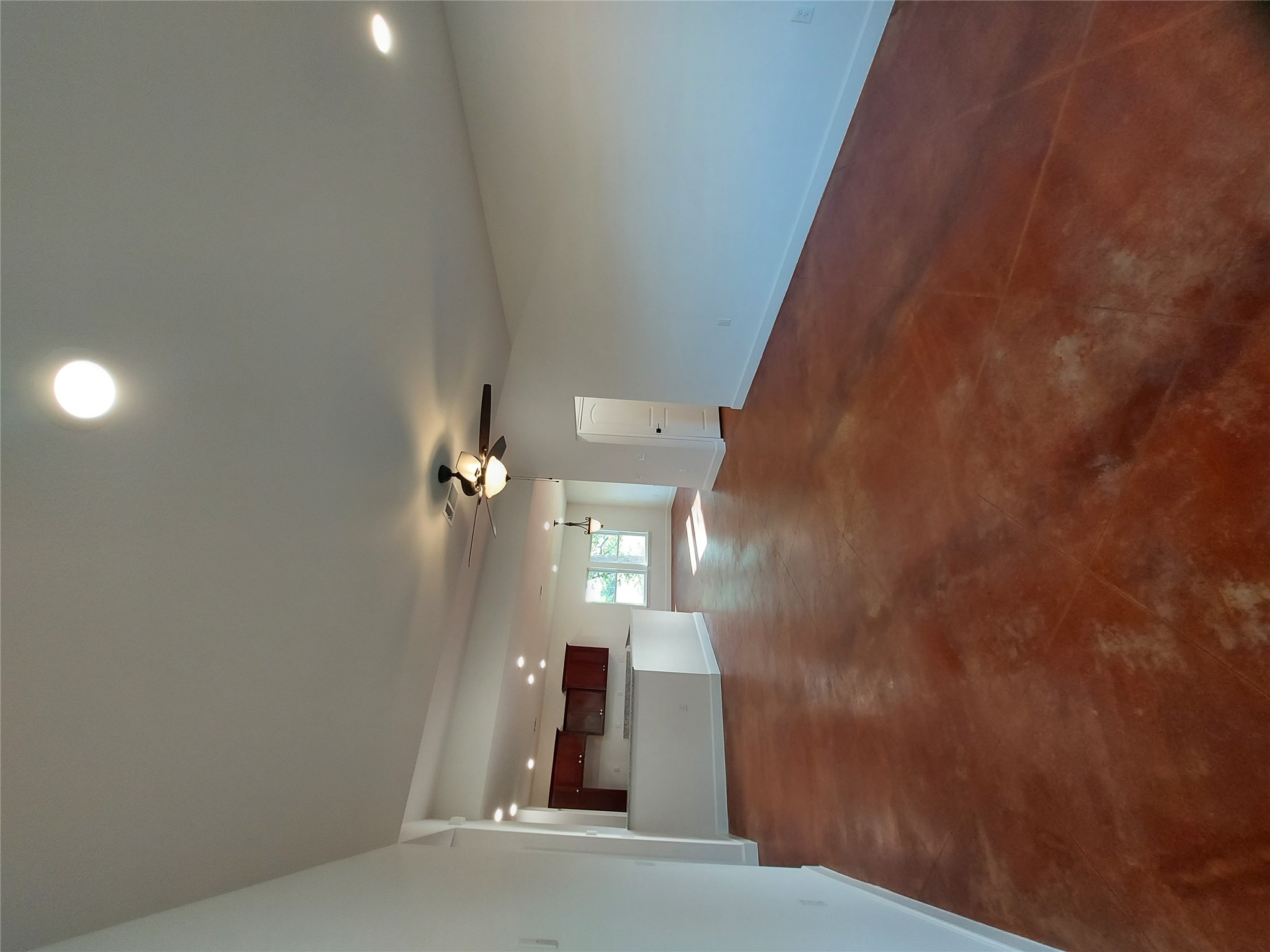 121 Spanish Oak Trail Cameron, TX 76520 - Photo 6 of 36 en empty room with windows and ceiling fan