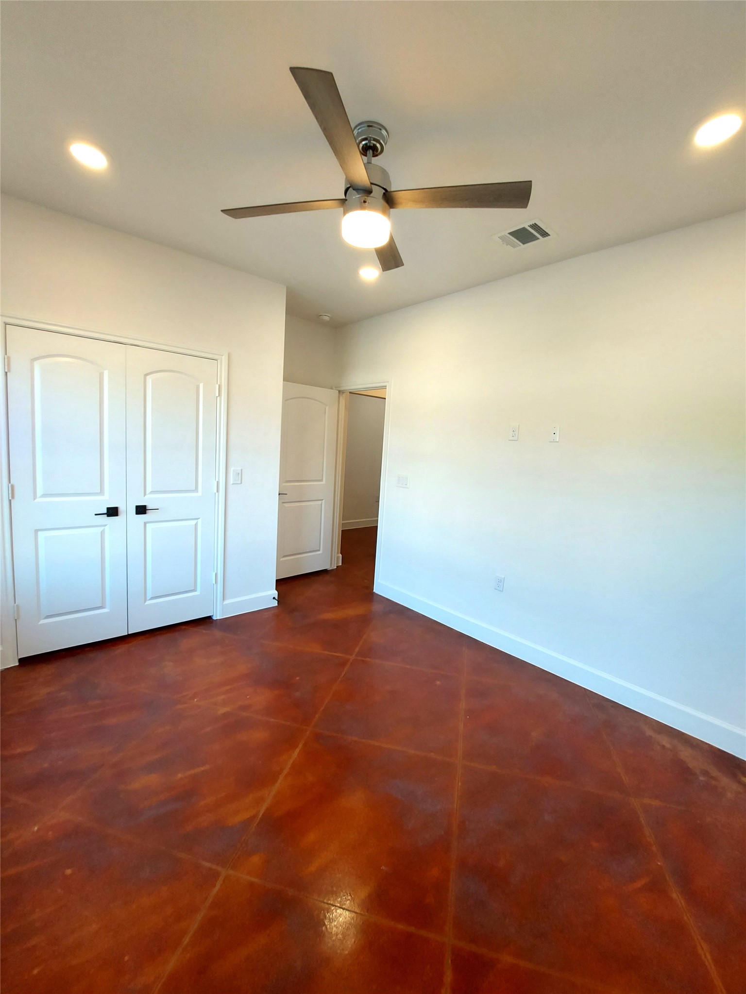 121 Spanish Oak Trail Cameron, TX 76520 - Photo 10 of 36 an empty room with closet and fan