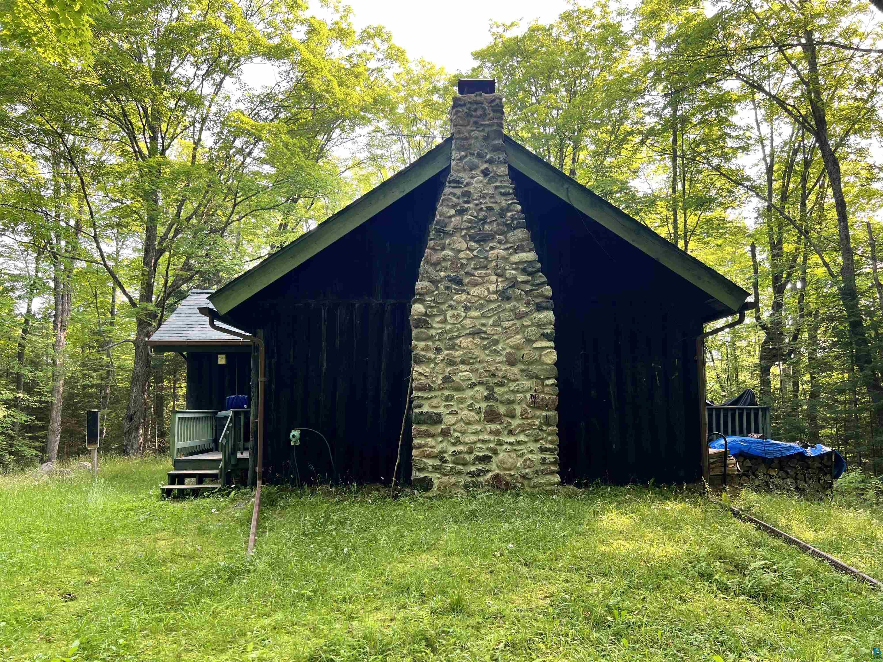 26336 Forest Road 181 Glidden, WI 54527 - Photo 2 of 18 View of outdoor structure with a lawn
