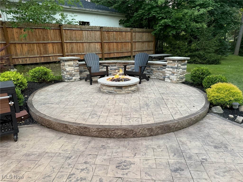 10620 Ridge Road North Royalton, OH 44133 - Photo 30 of 35 View of patio featuring a fire pit