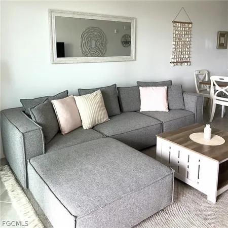 a living room with furniture and a couch