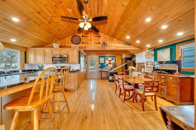 a view of a patio with table and chairs