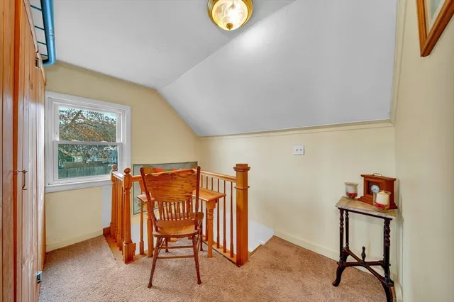 a workspace with furniture and a window