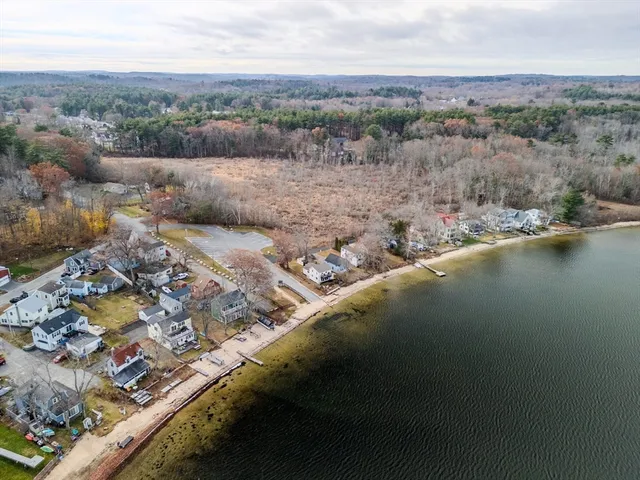 a view of a house with brick walls