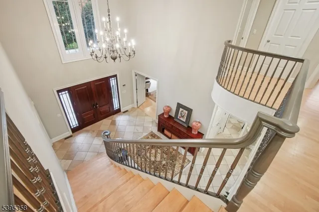 a bed room with a bed and a large window