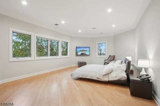 a view of a hallway with bathroom