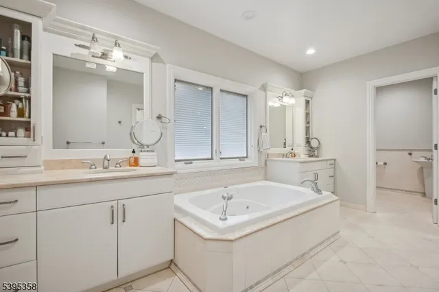 a bed room with a bed and a large window