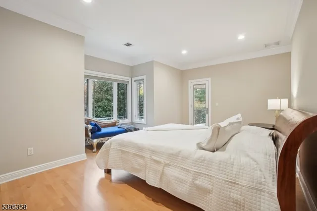 a bed room with a bed and a window