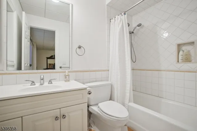 a bathroom with a bathtub and a sink