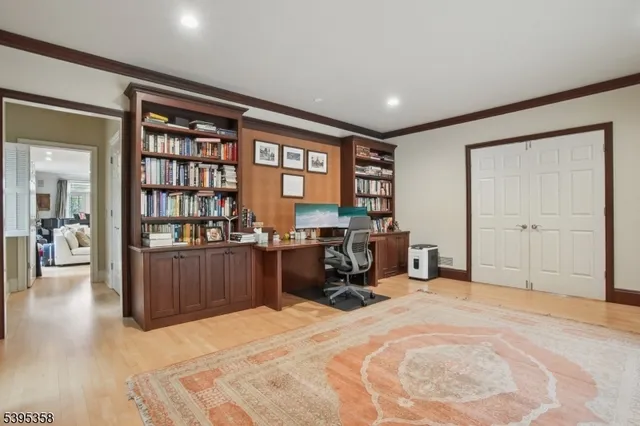 a bed room with a bed and a large window