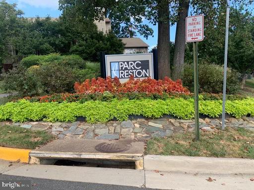 1785 Jonathan Way, Unit B Reston, VA 20190 - Photo 1 of 35 a view of a house with a yard and a bench