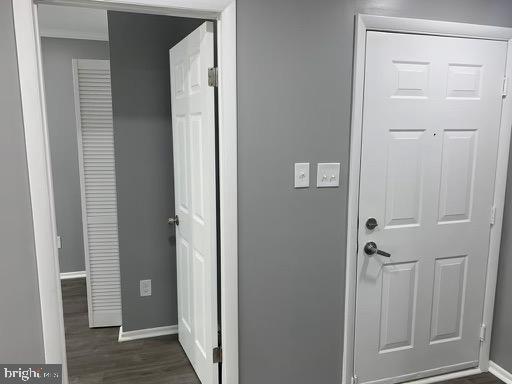 1785 Jonathan Way, Unit B Reston, VA 20190 - Photo 16 of 35 a view of a hallway with wooden floor