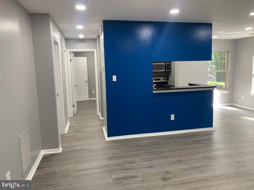 1785 Jonathan Way, Unit B Reston, VA 20190 - Photo 4 of 35 a view of kitchen with wooden floor