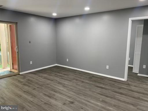 1785 Jonathan Way, Unit B Reston, VA 20190 - Photo 8 of 35 an empty room with wooden floor and windows