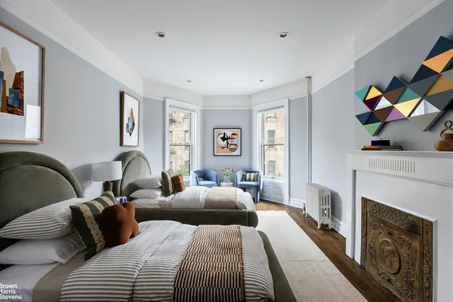a bathroom with a sink toilet and mirror