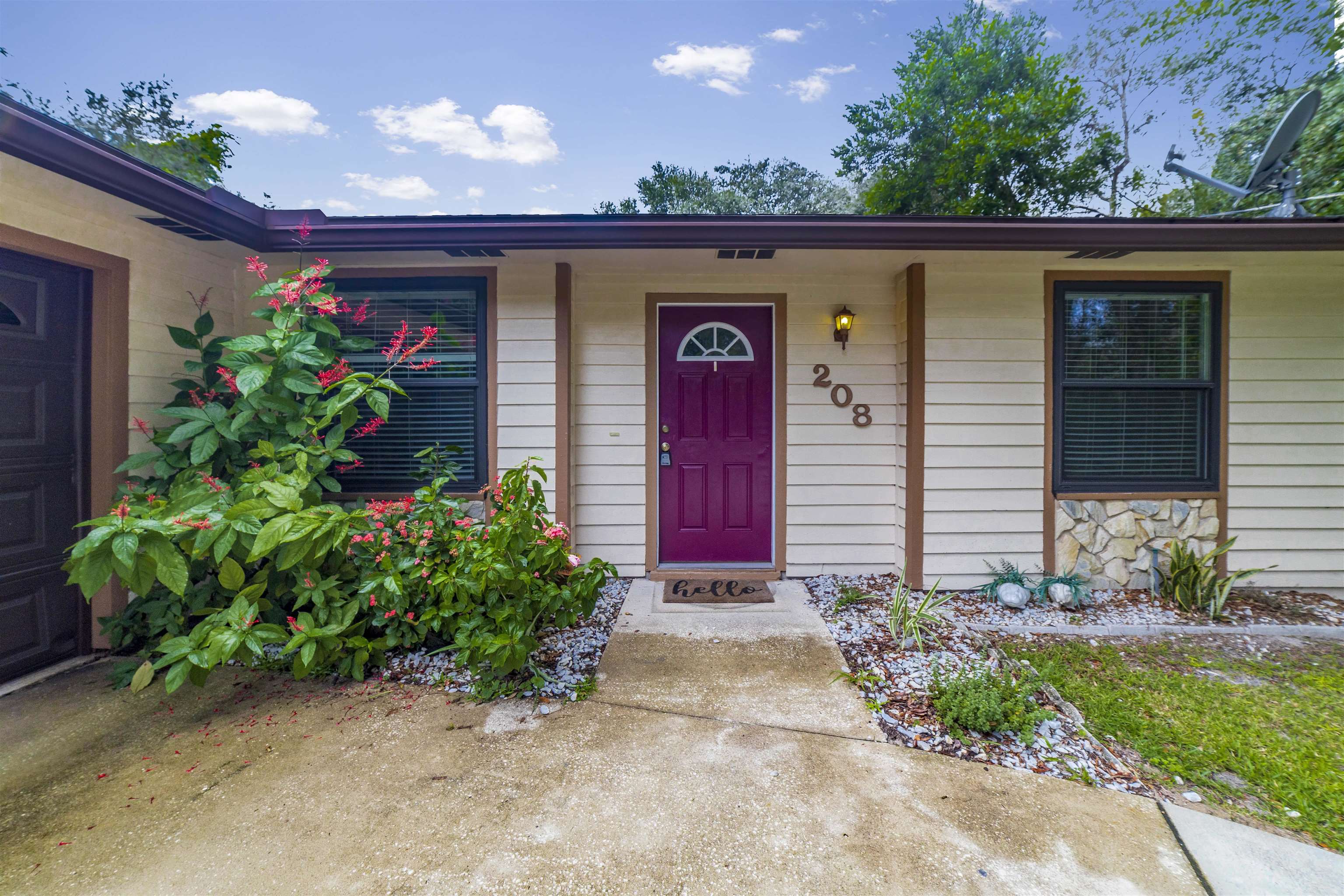 208 Jasmine Road St. Augustine, FL 32086 - Photo 1 of 34 front view of a house with a small yard