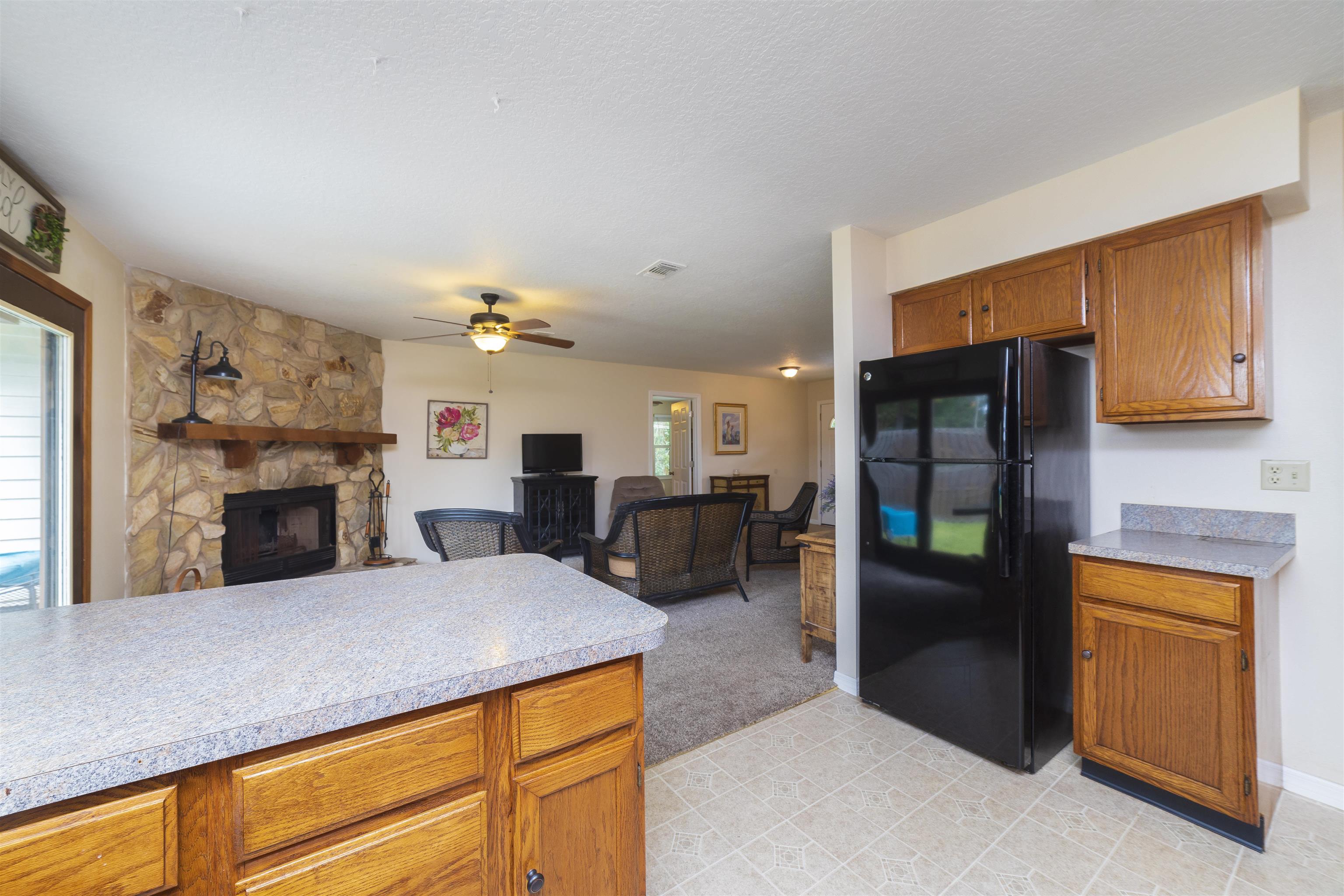 208 Jasmine Road St. Augustine, FL 32086 - Photo 14 of 34 a kitchen with cabinets and refrigerator