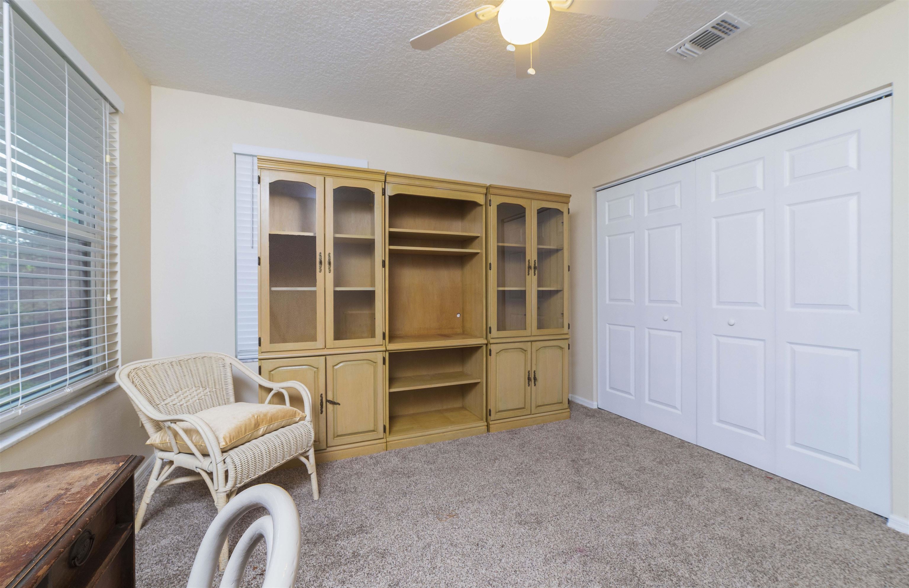 208 Jasmine Road St. Augustine, FL 32086 - Photo 27 of 34 a room with a furniture and a window