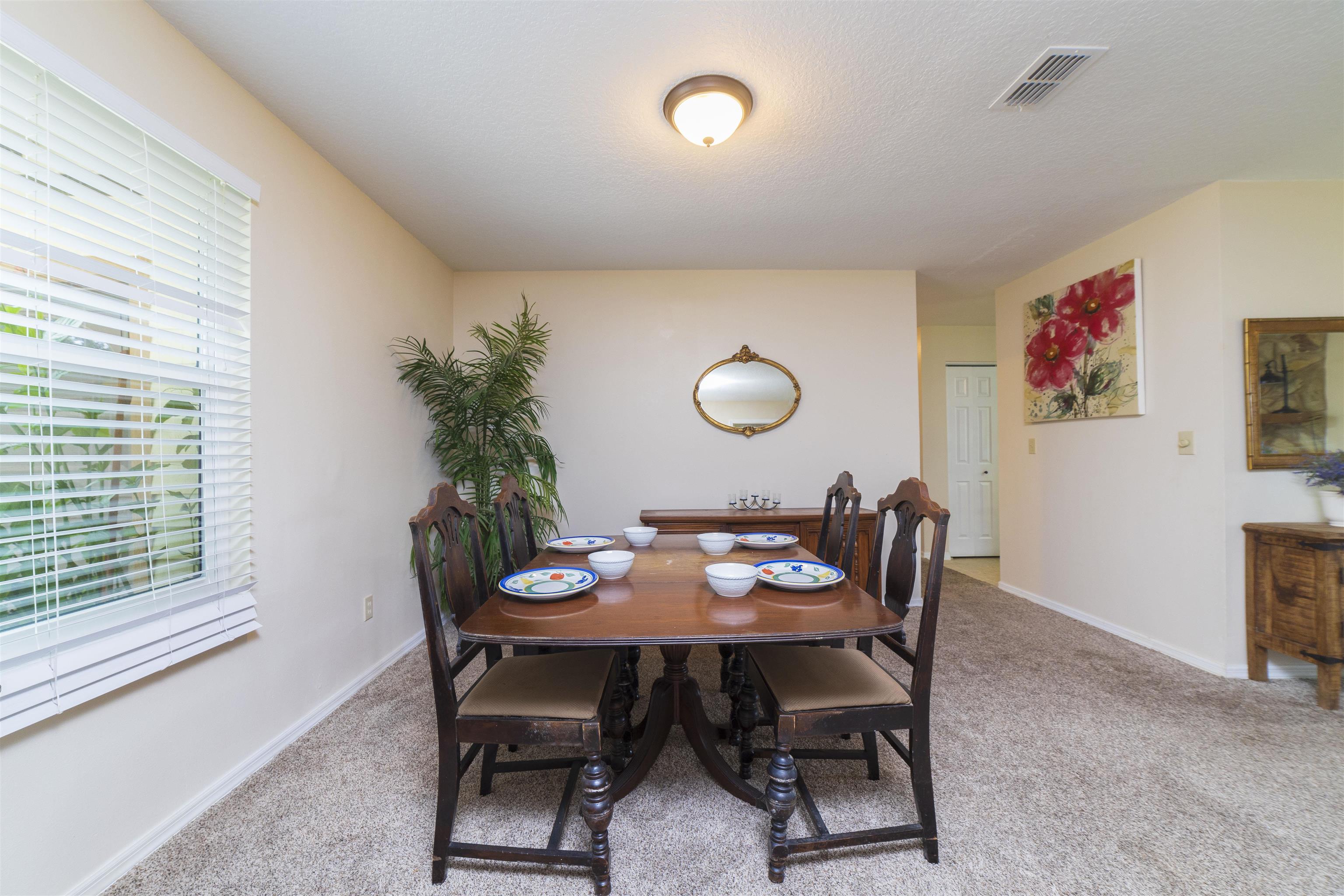 208 Jasmine Road St. Augustine, FL 32086 - Photo 6 of 34 a dining room with furniture and window